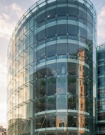 Structural glazing systems for high-rise commercial buildings