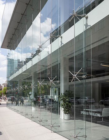 Spider glazing and fin glazing systems